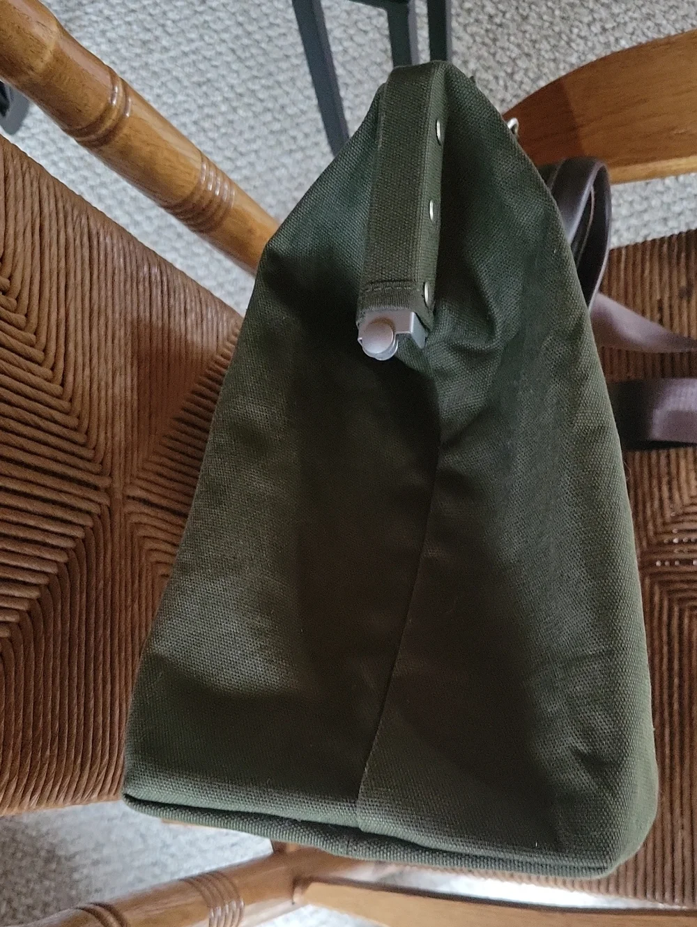Line of Trade green military duffle sack with brown canvas strap
